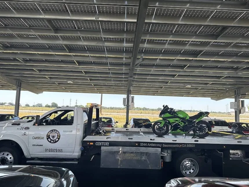 Motorcycles secured on Tiger Towing’s flatbed